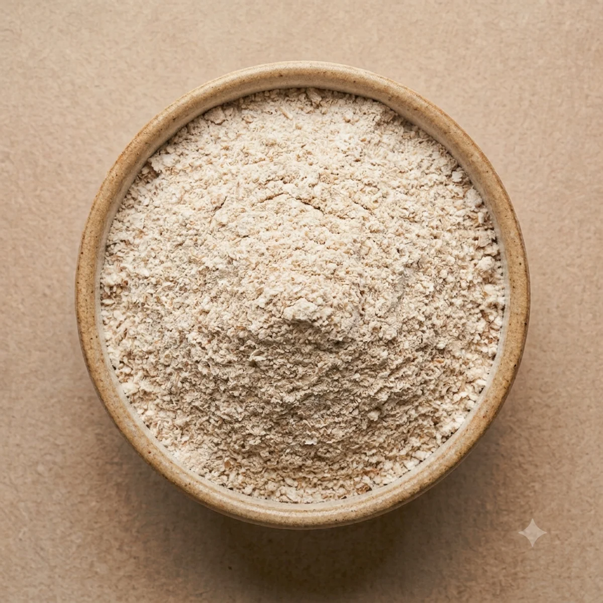 Wheat atta in a stoneware bowl